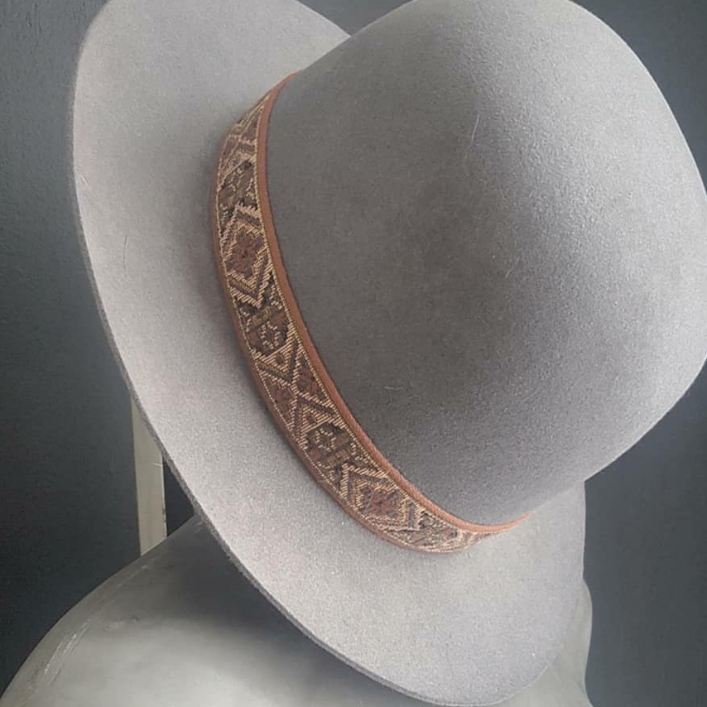 Gray and Orange Hat with Geometric Trim